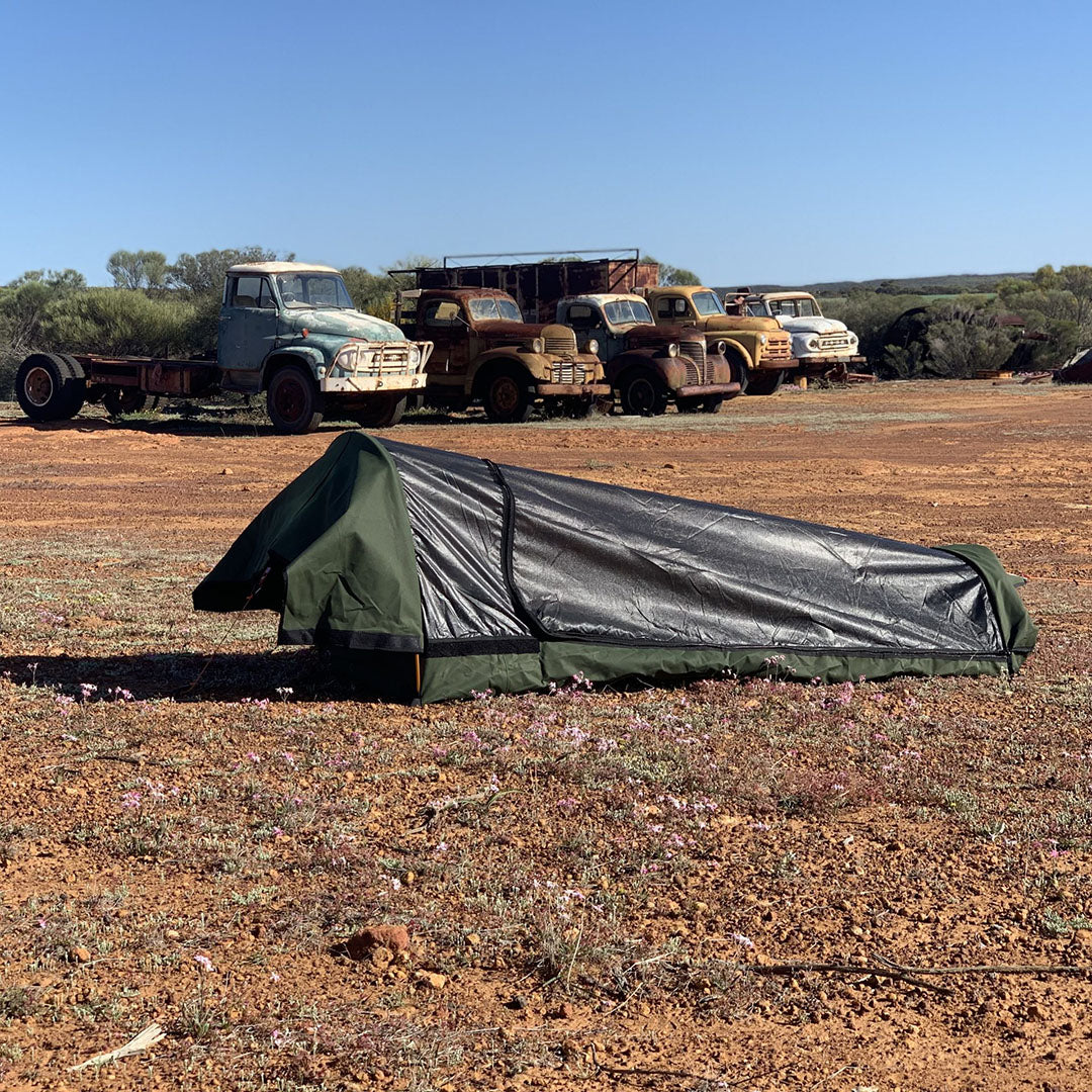 AOS Australian Made Tracker Deluxe Dome Swag King Single, green canvas camping gear for outdoor adventures.