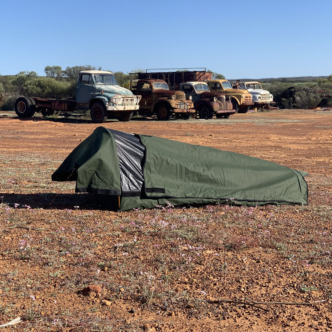 AOS Australian Made Tracker Deluxe Dome Swag King Single, green canvas camping gear for outdoor adventures.